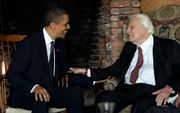 Oud-president Obama (l.) en Billy Graham. beeld The White House