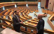 Politiek redacteuren Kees de Groot (links) en Addy de Jong kijken vooruit naar de Tweede Kamerverkiezingen. beeld RD