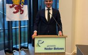 Tim van Ooijen verdedigde met succes zijn voorstel voor een jeugdwaardering in de gemeenteraad van Neder-Betuwe. beeld RD