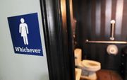 DURHAM. Een genderneutraal toilet in de stad Durham, North Carolina. In de VS woedt een verhit debat over de rechten van transgenders om hun toilet van keuze te bezoeken. beeld AFP, Sara D. Davis