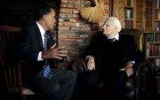 Presidentskandidaat Mitt Romney in gesprek met Billy Graham. Romney bracht enkele weken geleden een bezoek aan Graham in Montreat in North Carolina. Foto AFP