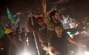 Inwoners van Gaza vieren de wapenstilstand. Foto EPA