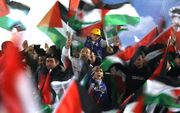 Feest in de Palestijnse gebieden na de statusverhoging. Foto AFP
