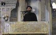 IS-leider Al-Baghdadi op een video-opname vanuit Mosul. beeld AFP