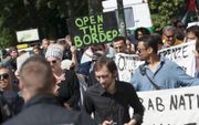 Pro-Palestijnse demonstranten protesteren op 23 juli bij de Egyptische ambassade in Berlijn. Beeld EPA