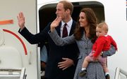 William, Kate en George. Beeld AFP
