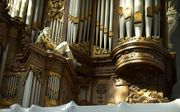 De restauratie van het orgel van de Amsterdamse Oude Kerk is begonnen. Beeld ANP