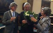 Herman van Vliet met zijn vrouw en burgemeester Bolsius (l.) van Amersfoort. Beeld RD