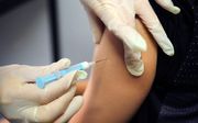 De Australische regering wil ouders die vaccinaties weigeren, hun kinderbijslag onthouden. beeld AFP