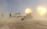Het Irakese leger voert strijd tegen IS, en wordt daarbij geholpen door sjiietische milities. beeld AFP
