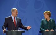 Netanyahu (l.) en Merkel (r.). beeld EPA