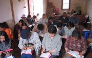 Samenkomst van een huiskerk in China. beeld RD