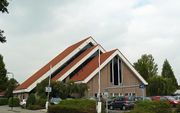 Kerkgebouw van de gereformeerde gemeente in Nederland te Gouda (Gerbrandyweg). beeld Reliwiki