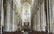 „Reken maar dat de mensen 1000 jaar terug precies hetzelfde dachten als wij bij binnenkomst van een kathedraal: wat hoog!” Foto: de kathedraal van Amiens. beeld iStock