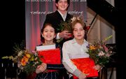 De drie winnaars (v.l.n.r.): Julia Nefedov, Andrei Makarov en Dimitri Zweers. beeld Anne Meyer