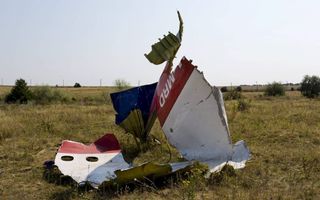 GRABOVO. Een wrakstuk van de op 17 juli 2014 neergestorte Boeing, vlucht MH17. Bij de ramp in Oost-Oekraïne kwamen alle 298 inzittende om. beeld ANP