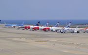 Vijf geparkeerde Boeing 737 Max 8's op een Spaans vliegveld. beeld EPA