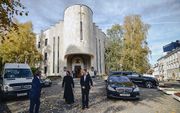 Gebouw in Minsk waar maandag de synode werd gehouden van de Russisch-Orthodoxe Kerk. beeld AFP