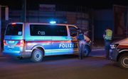 Politieonderzoek na de moord in Gerasdorf. beeld AFP
