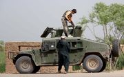 Afghaanse veiligheidstroepen in Helmand, Afghanistan. beeld EPA