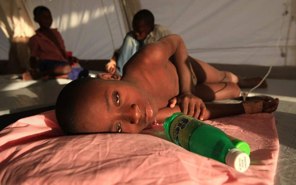 Cholerapatiëntje in Haïti. Foto EPA