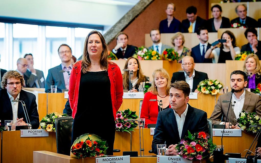 Installatie van nieuwe leden van de Amsterdamse gemeenteraad na de verkiezingen in 2014. beeld ANP