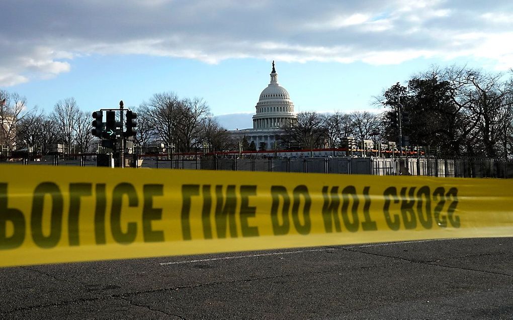 Politietape rondom het Capitool. beeld AFP, Timothy A. Clary