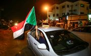 Feest in Soedan nadat de president is afgezet. beeld AFP