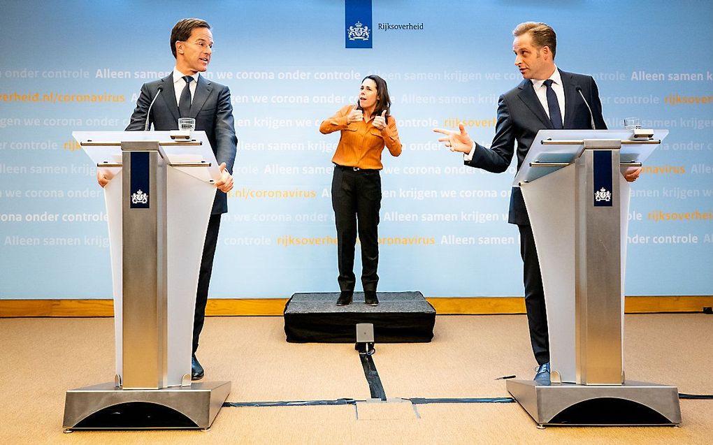 Premier Rutte (l.) en vicepremier De Jonge tijdens de persconferentie van dinsdagavond. beeld ANP, Bart Maat