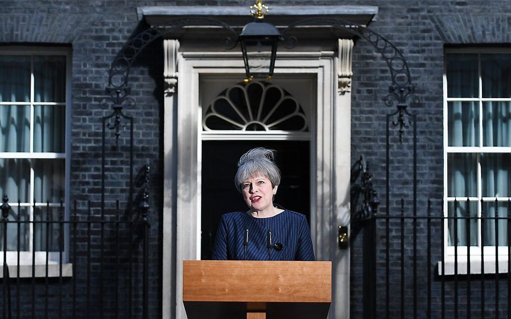 De Britse premier May tijdens haar verklaring dinsdag. Beeld AFP