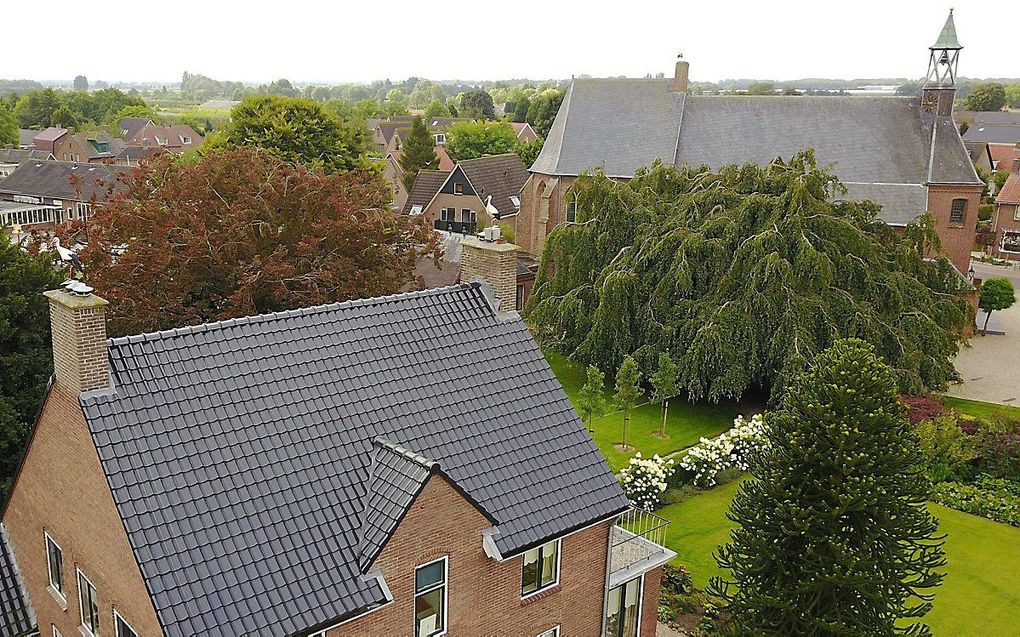 Pastorie en kerk van de hervormde gemeente in Randwijk. beeld VidiPhoto