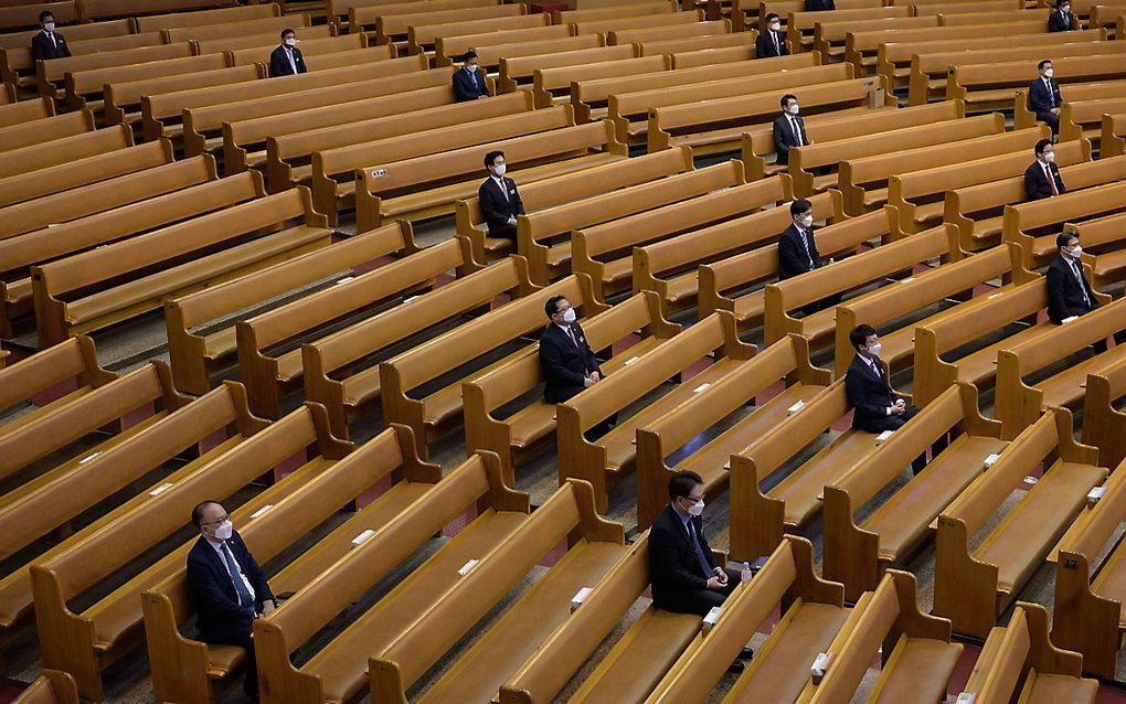 Kerkdienst in coronatijd in China. beeld AFP