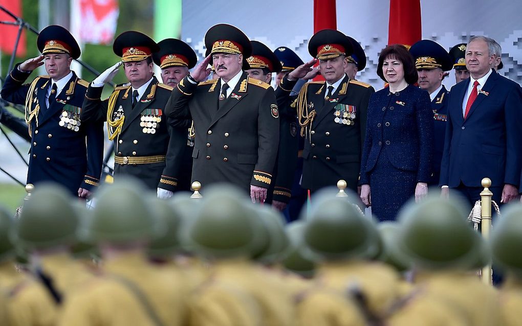 Aleksandr Loekasjenko tijdens een militaire parade eerder dit jaar. beeld AFP