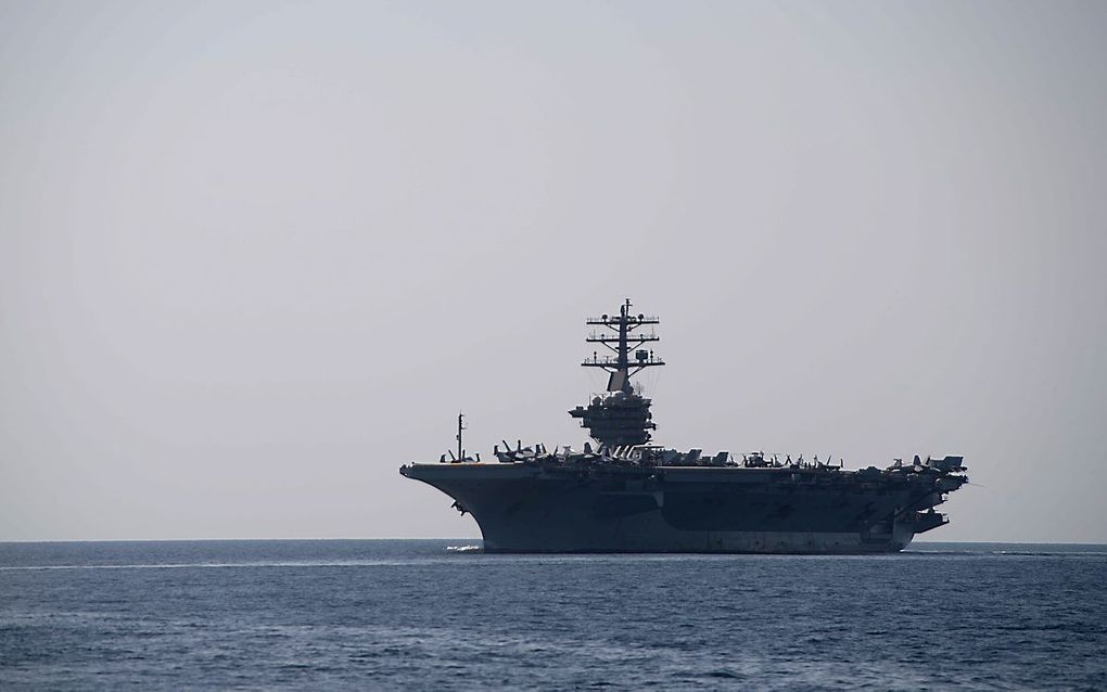 Archiefopname van het Amerikaanse vliegdekschip USS Nimitz, dat zich uit de Golf terugtrekt om de spanning met Iran te verminderen. beeld  AFP, C. Kellums