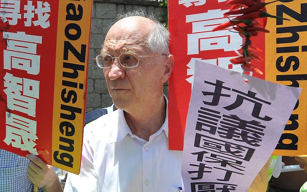 De Amerikaan John Clansey is een van de in Hongkong gearresteerde activisten. beeld AFP, Laurent Fievet