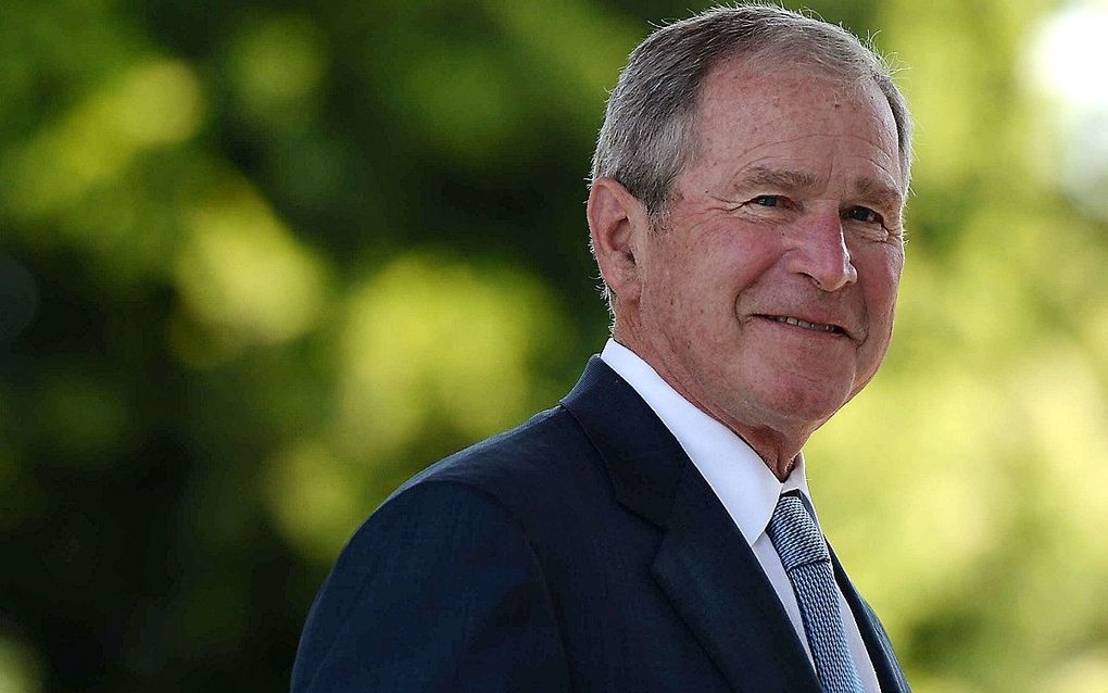 De Amerikaanse oud-president George W. Bush. beeld AFP, Monirul Bhuiyan