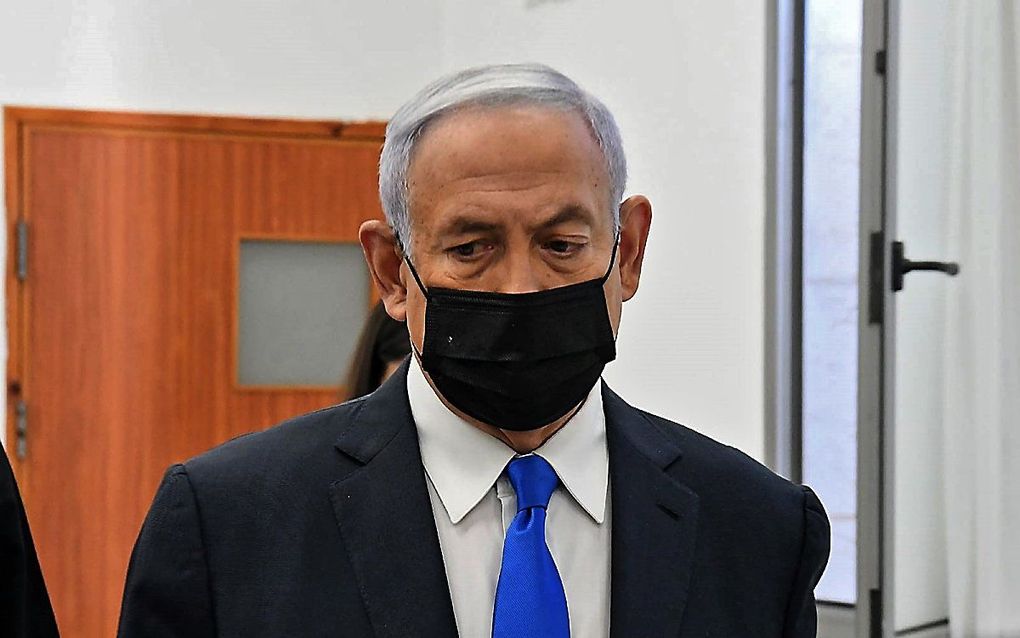 Netanyahu arriveert bij zijn proces. beeld AFP