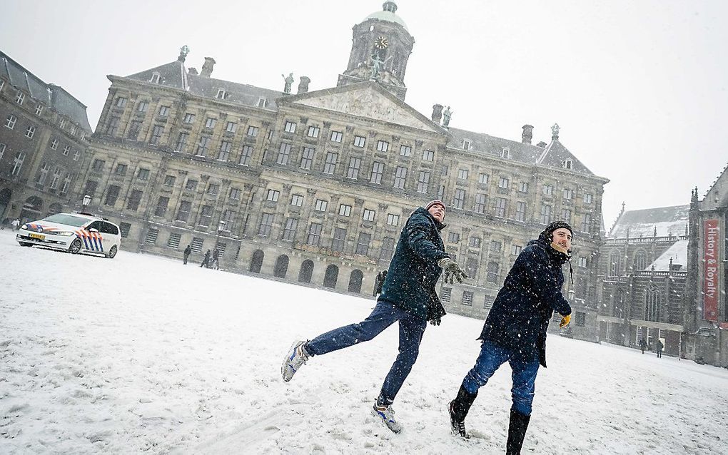 Sneeuwpret in Amsterdam. beeld ANP