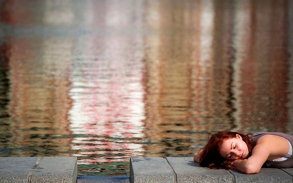 Een steen de vijver schudt mensen wakker. beeld ANP, Robin van Lonkhuijsen