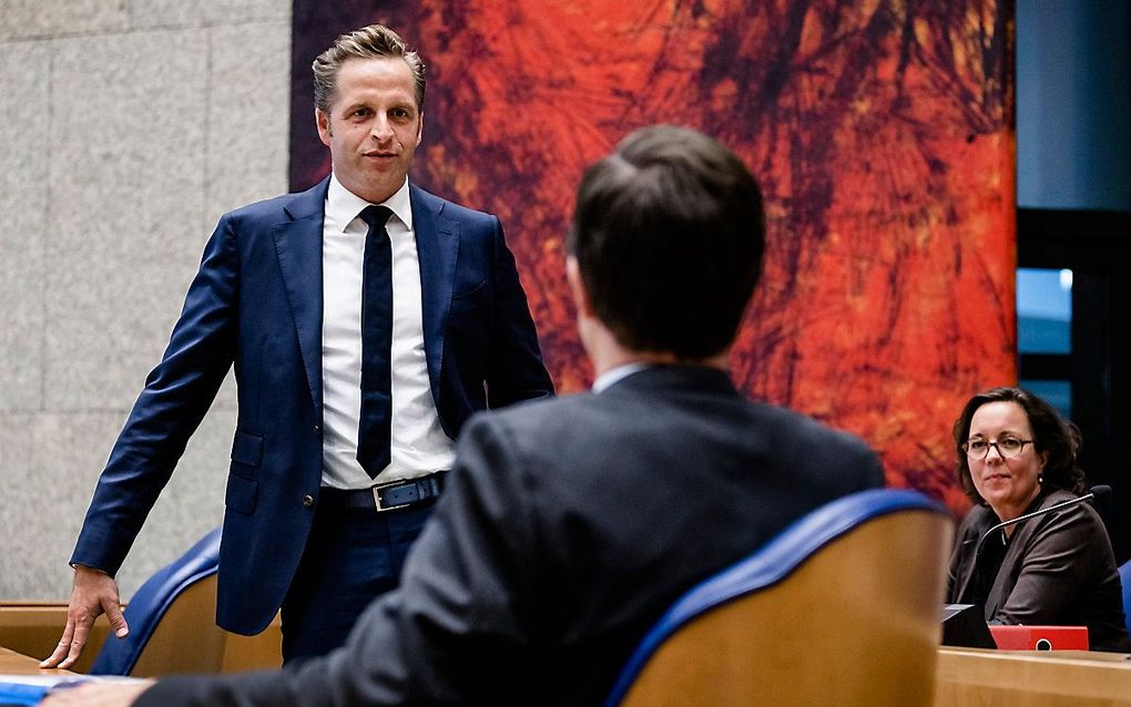 De demissionaire ministers De Jonge, Rutte en Van Ark, donderdag in de Kamer. beeld ANP, Remko de Waal