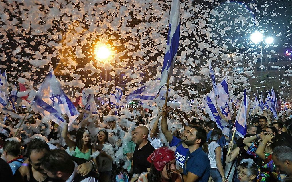 Feest op straat in Tel Aviv na de stemming. beeld AFP, JACK GUEZ