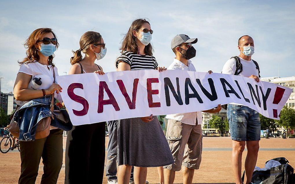 Een demonstratie dinsdag in Zwitserland voor vrijlating van de Russische oppositieleider Navalny. beeld EPA, Magali Girardin