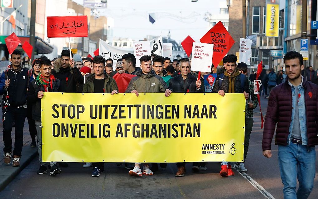 Protest tegen de uitzetting van Afghaanse vluchtelingen op het Domplein in 2018. beeld ANP, BAS CZERWINSKI