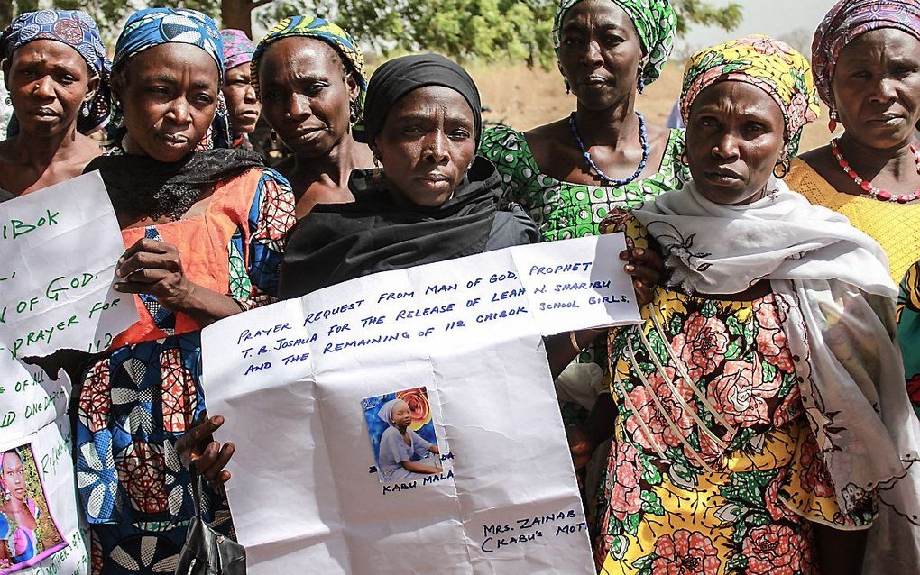 Moeders van ontvoerde meisjes uit de Nigeriaanse stad Chibok tijdens een demonstratie in 2014. beeld AFP, Audu Ali Marte