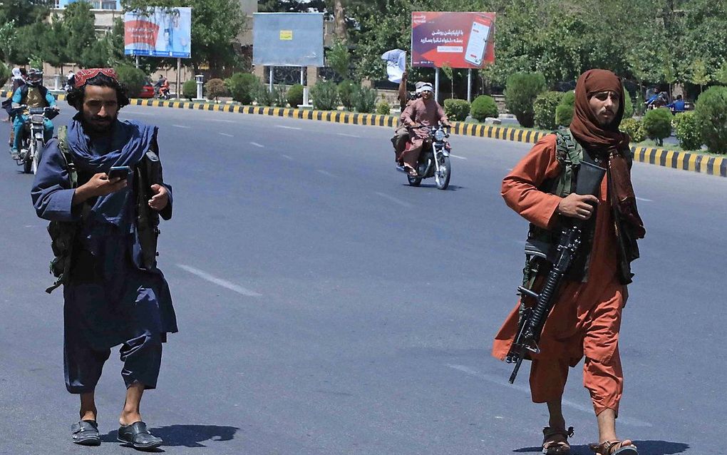 Taliban in de straten van Herat, een eerder veroverde stad in Afghanistan. beeld AFP