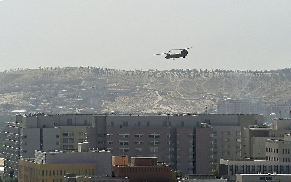 Amerikanen vertrekken uit Kabul. beeld AFP, Wakil KOHSAR