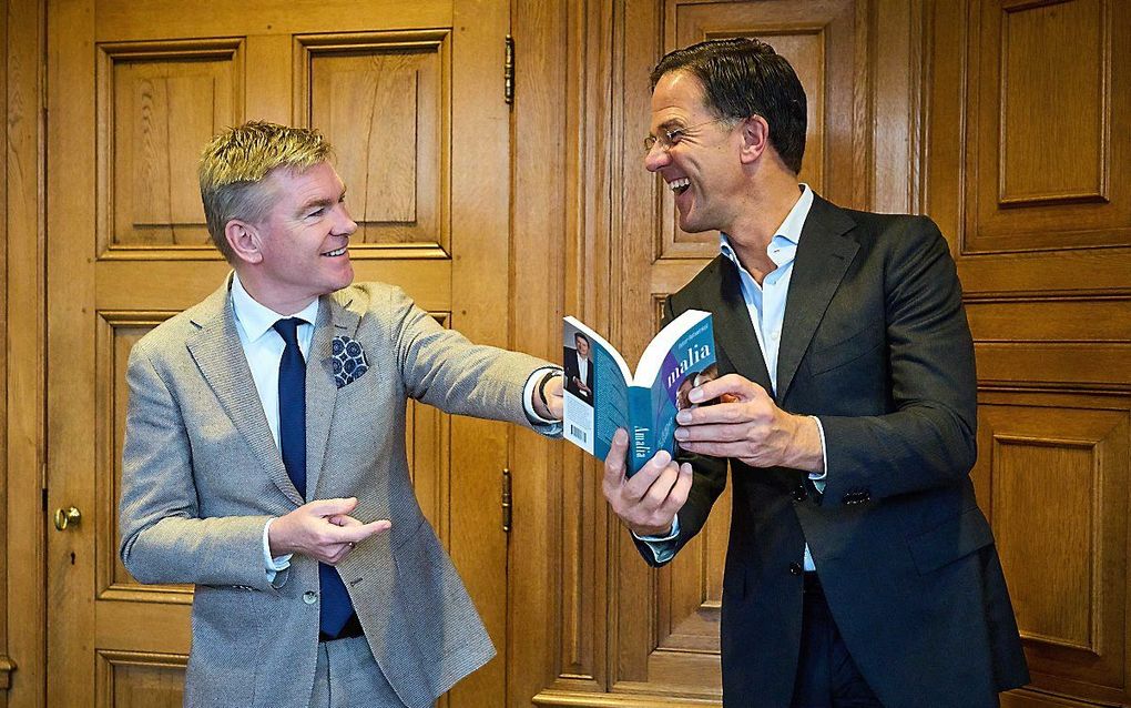 Rutte neemt boek van Rehwinkel over Amalia in ontvangst, beeld ANP, Phil Nijhuis