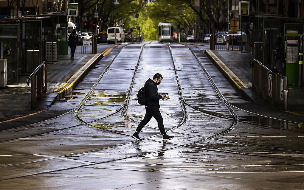 Stilte op straat in Melbourne tijdens de lockdown. beeld EPA, DANIEL POCKETT