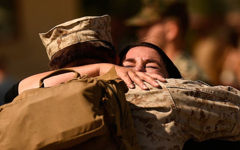 Amerikaanse militair komt terug van missie naar Afghanistan. beeld AFP, Patrick T. FALLON