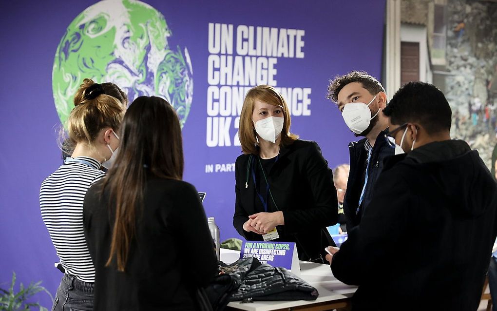 Mondmaskers op de klimaattop. beeld UK Government, Alan Harvey